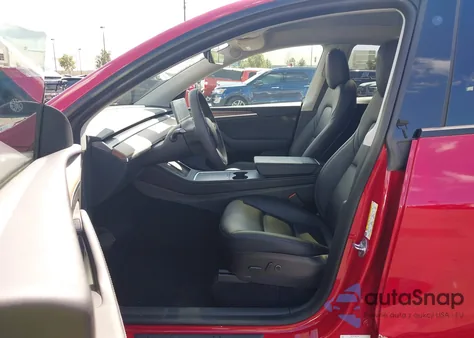 2023 Tesla Model Y Awd/Long Range Dual Motor All-Wheel Drive z USA, uszkodzony, nr VIN 7SAYGDEE8PF596824